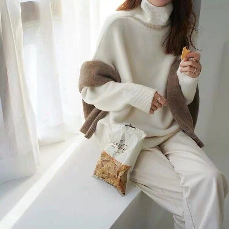 High-necked, padded sweater with a baggy look